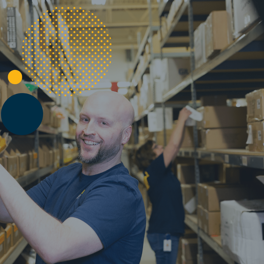 Efulfillment Service Employee Smiling With Clipboard and Large Dots