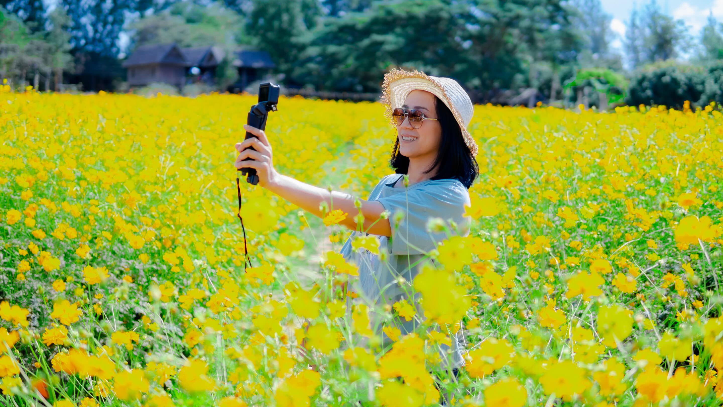 Beautiful blogger in the flowers garden Market Growth Image