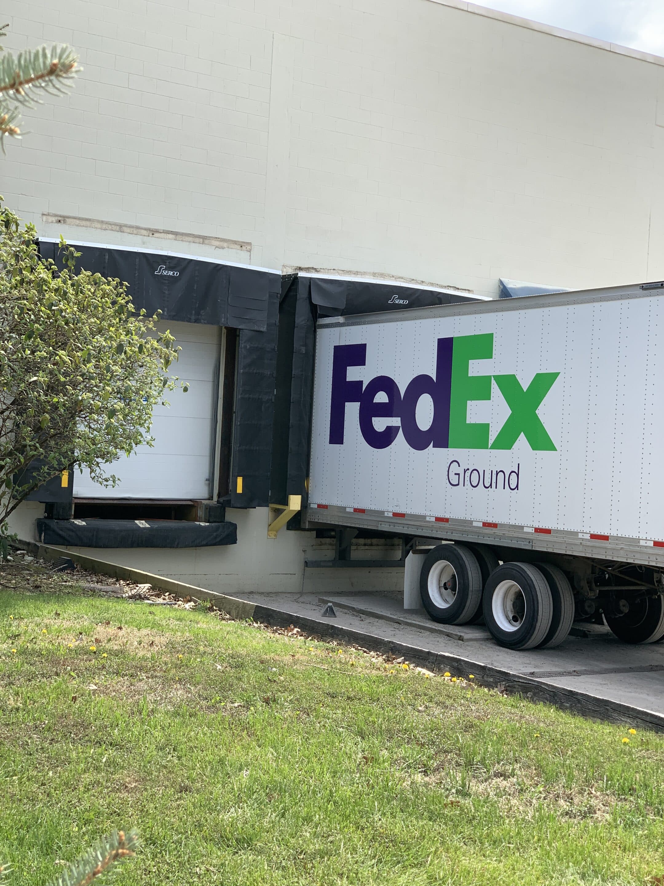 6AA64B83-6DFA-4518-A1C7-8E6AEDFFFB58 FedEx Ground truck being loaded with online orders from eFulfillment Service clients, who can take advantage of new options from FedEx