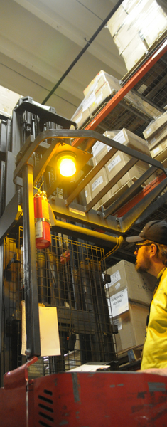 eFulfillment Service warehouse showing a forklift in the pallet stacks