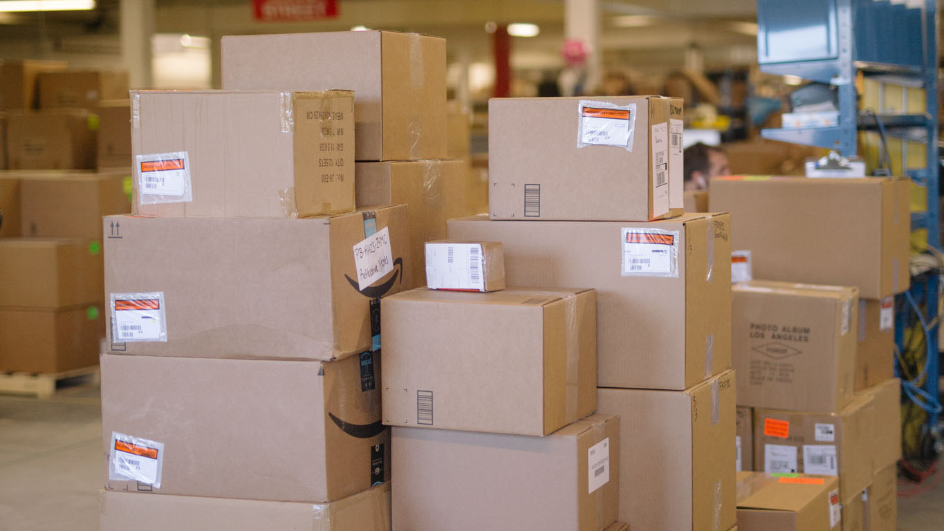 packaging on pallet stacked flat cardboard boxed