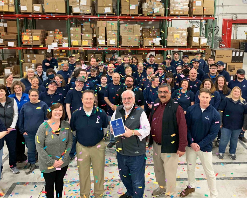 The eFulfillment Service team celebrating an award in their Traverse City warehouse