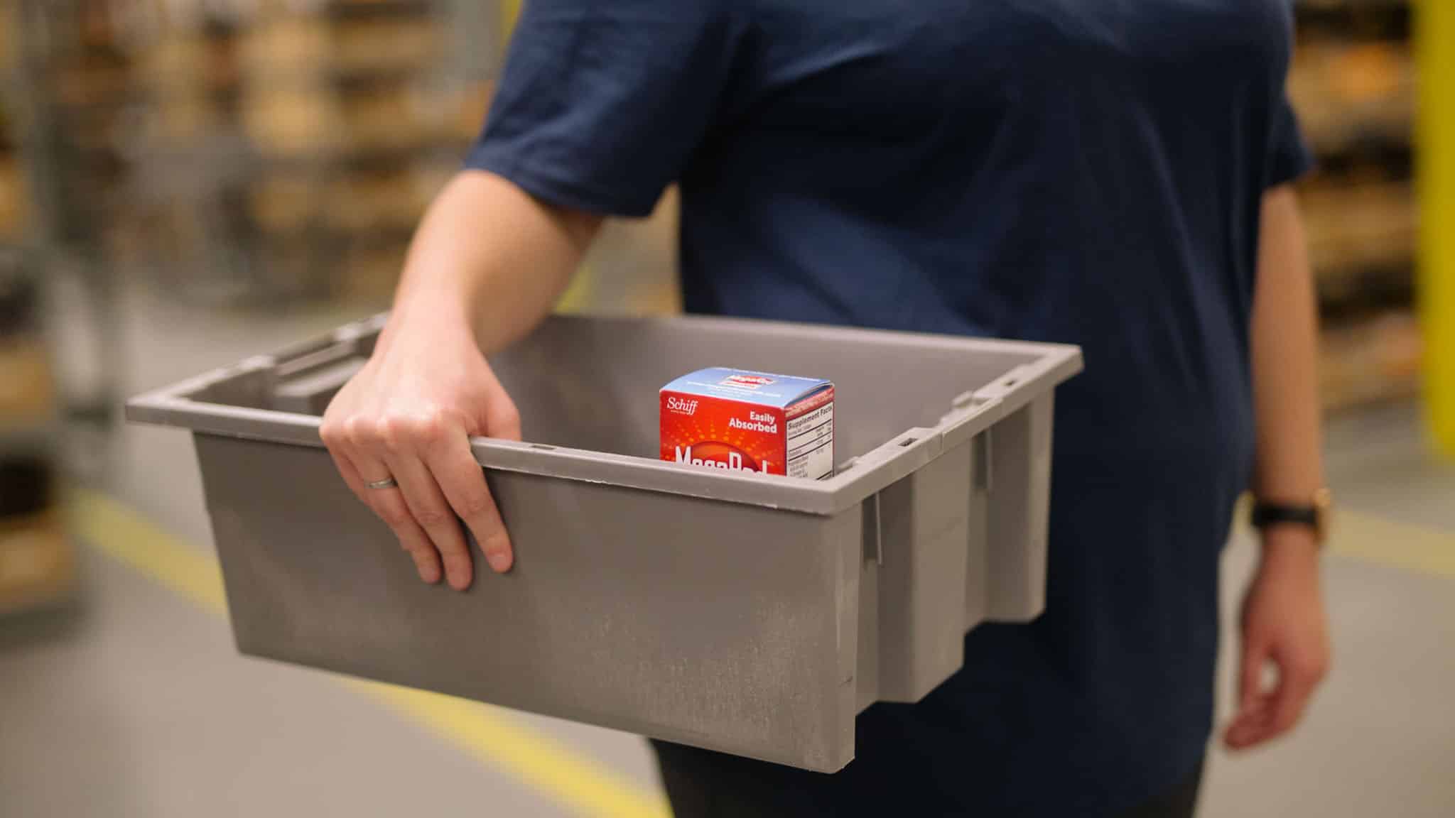 warehouse worker batch picking an order