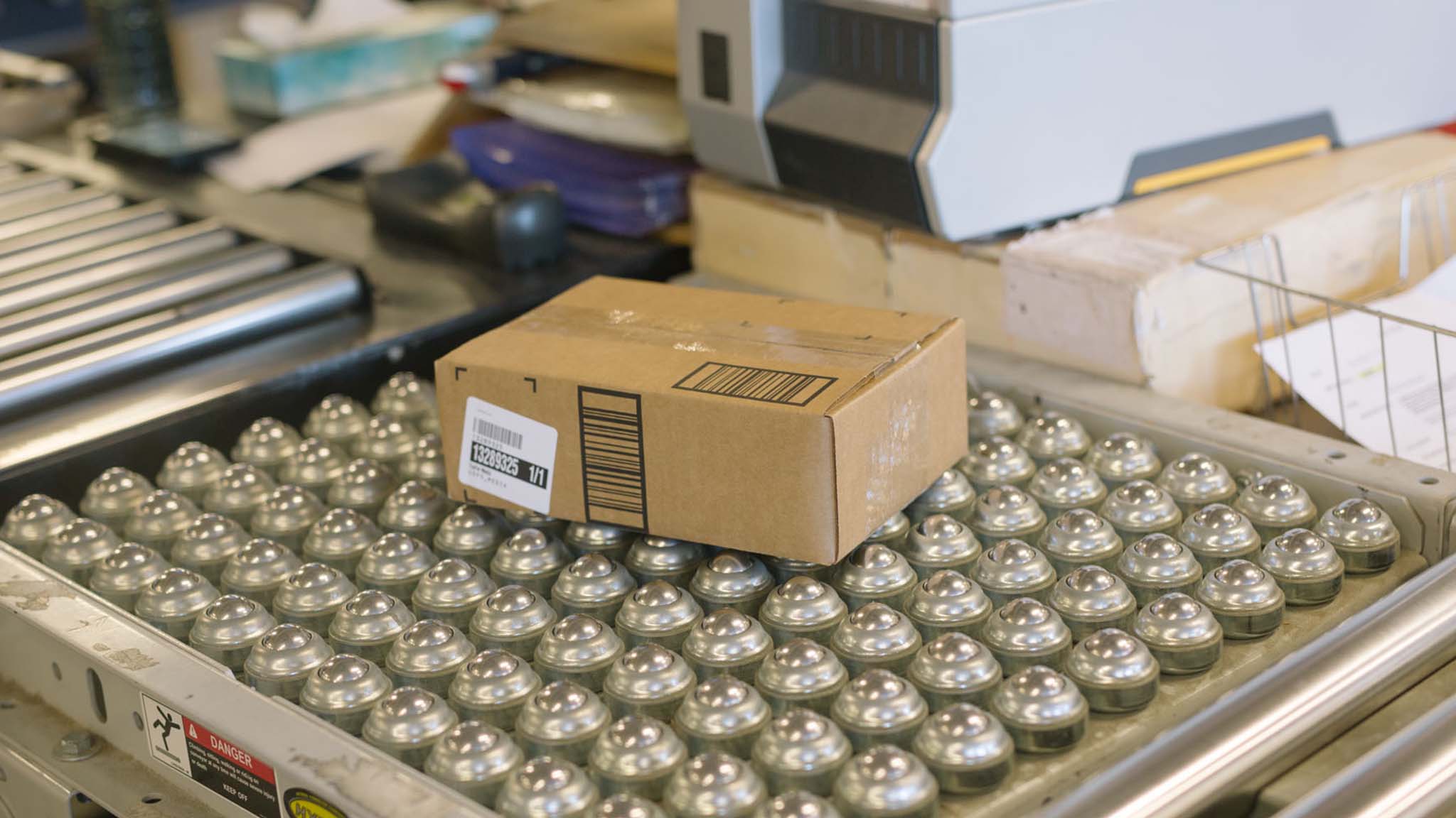 package on conveyor belt being shipped