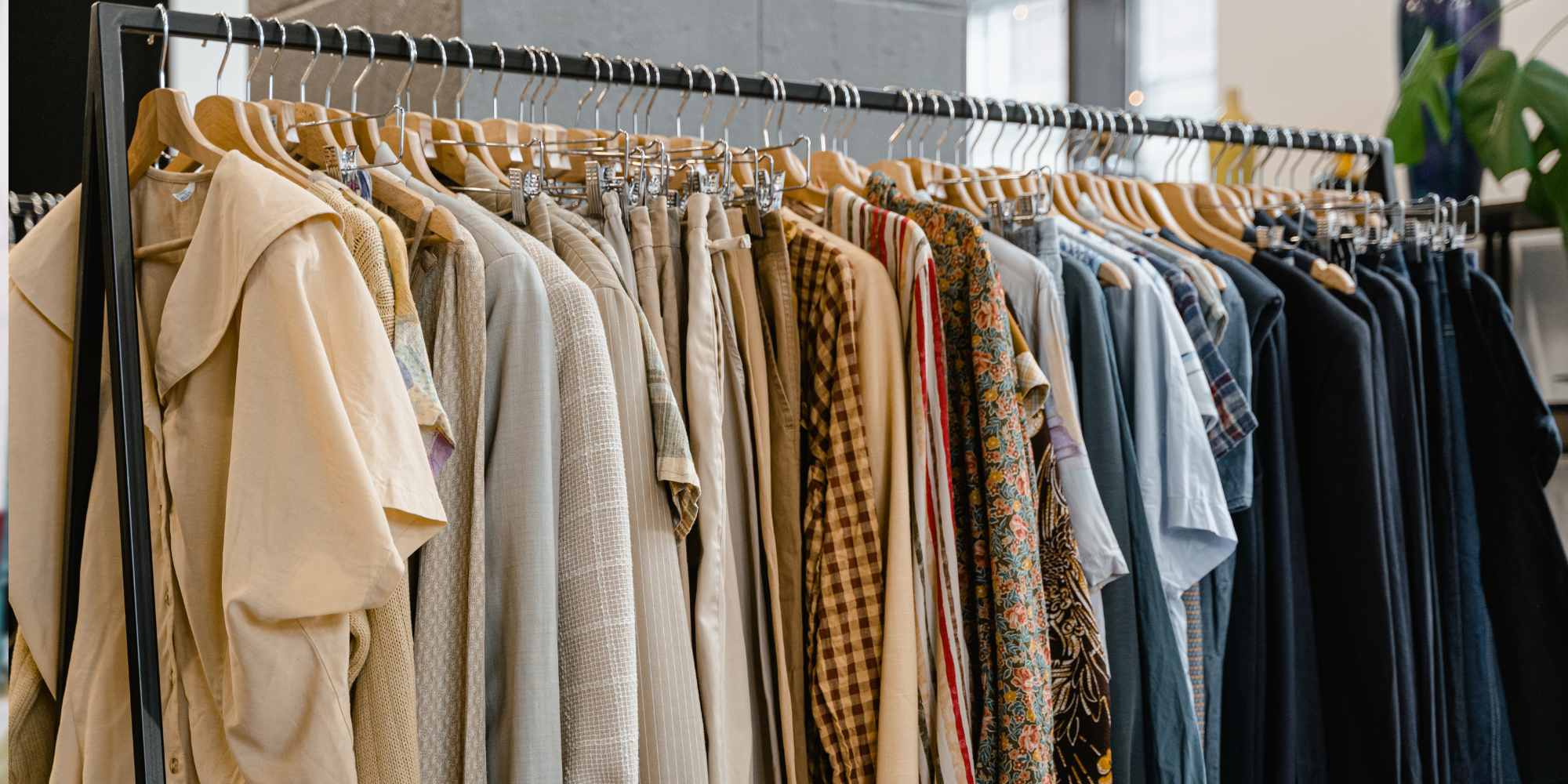 image of multicolored shirts on a clothing rack