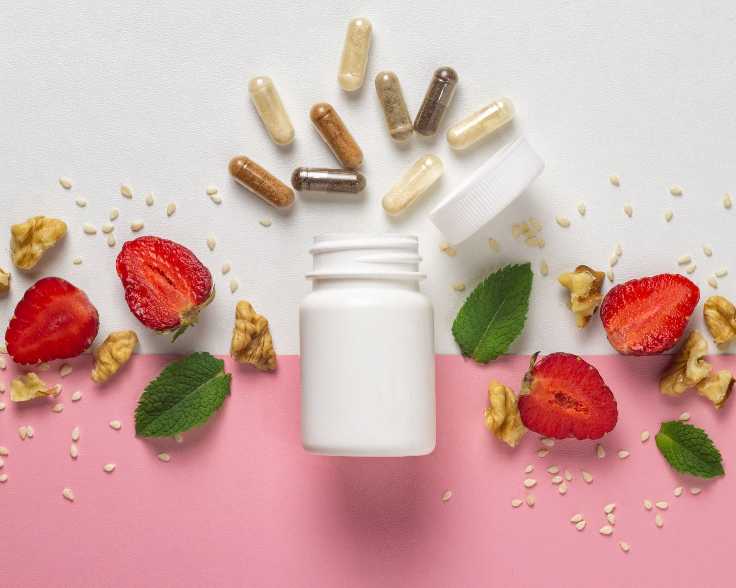 photo of a bottle of supplements and vitamins on a white and pink background surrounded by fruits