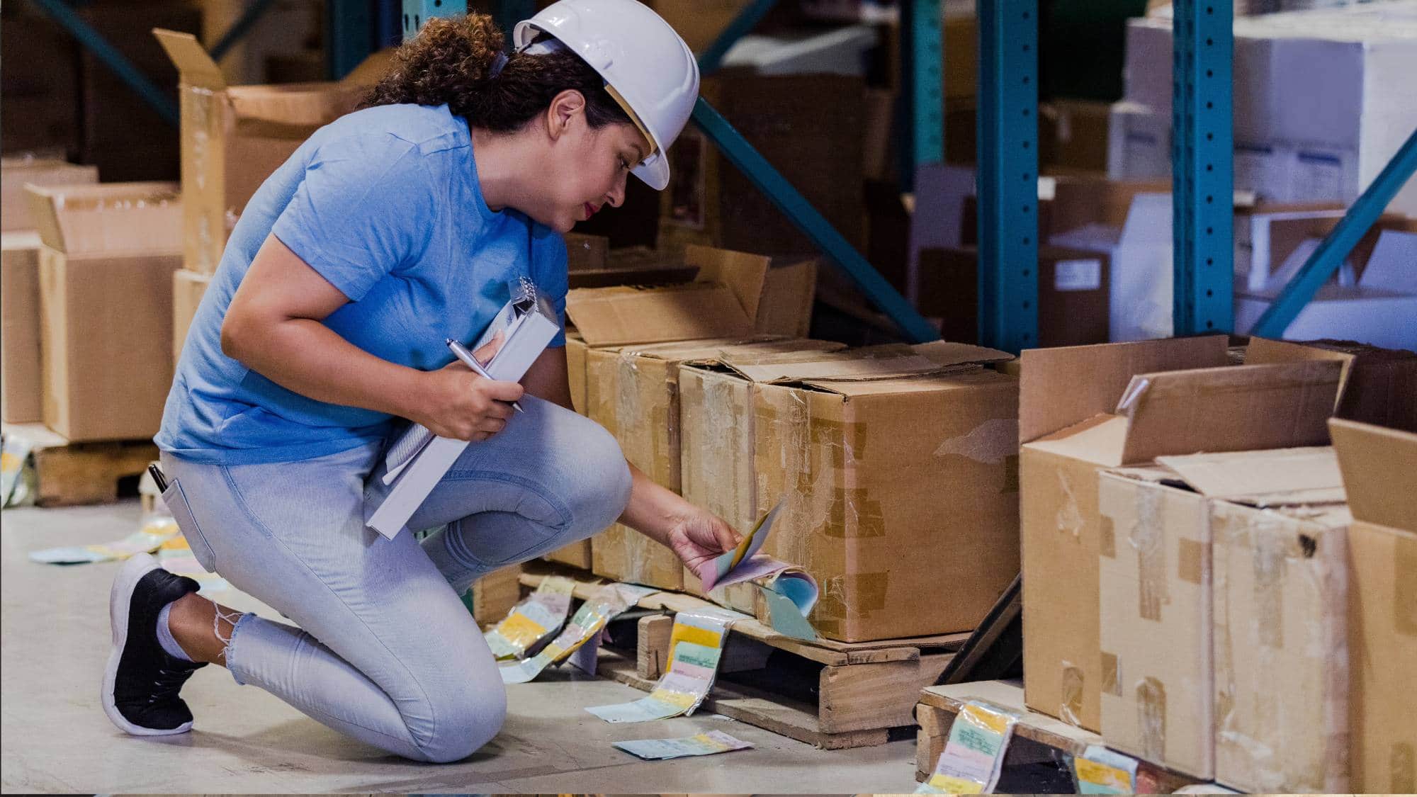 Warehouse worker picking items for e-commerce orders.