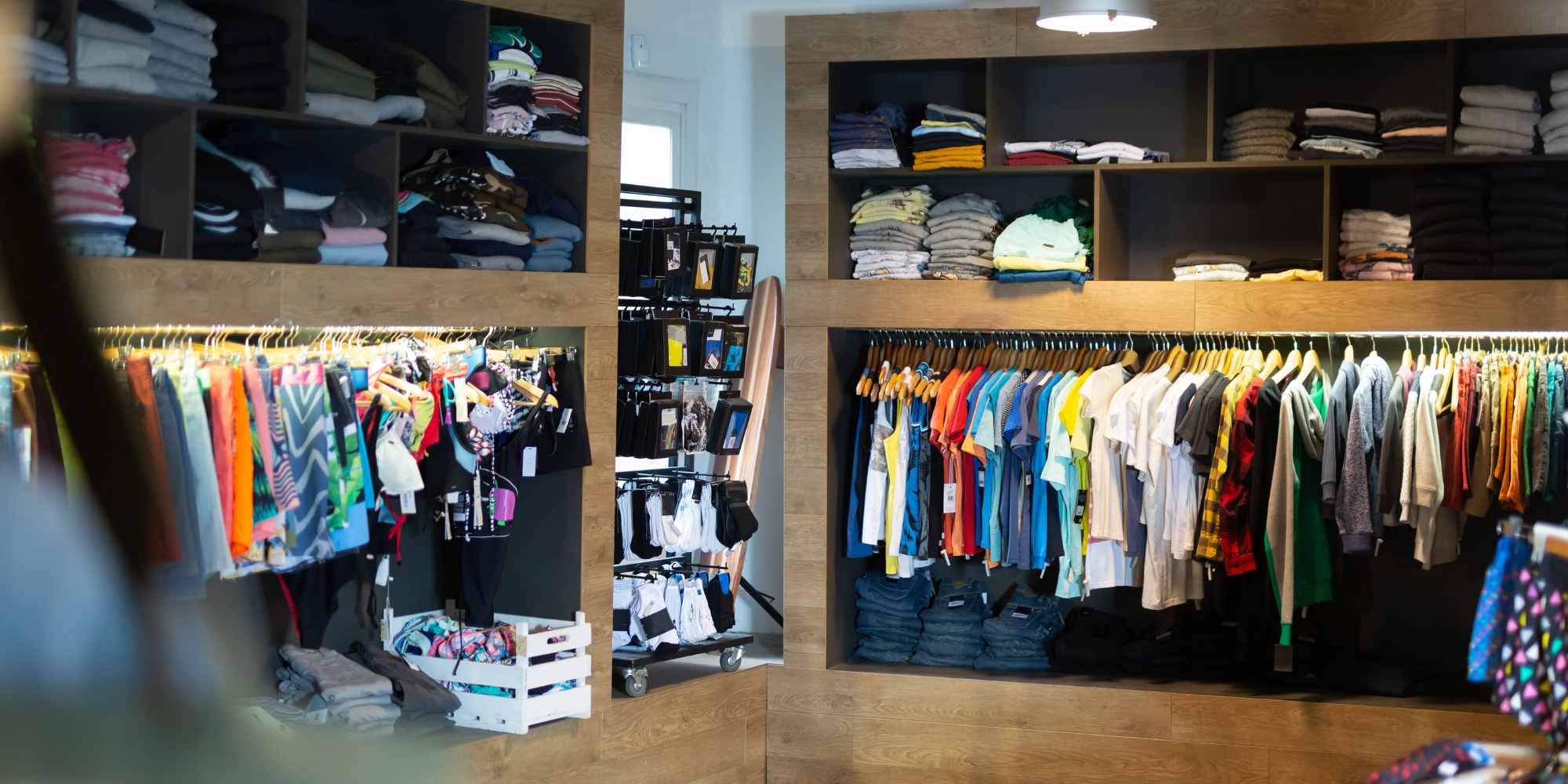 image of multicolored shirts on a clothing rack